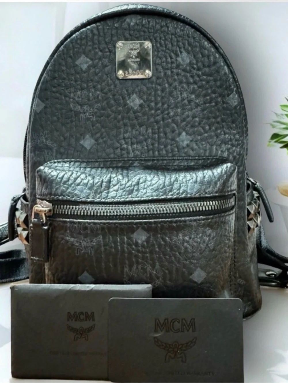 MCM Black Logo-Stamped Leather Mini Backpack with Stud Details